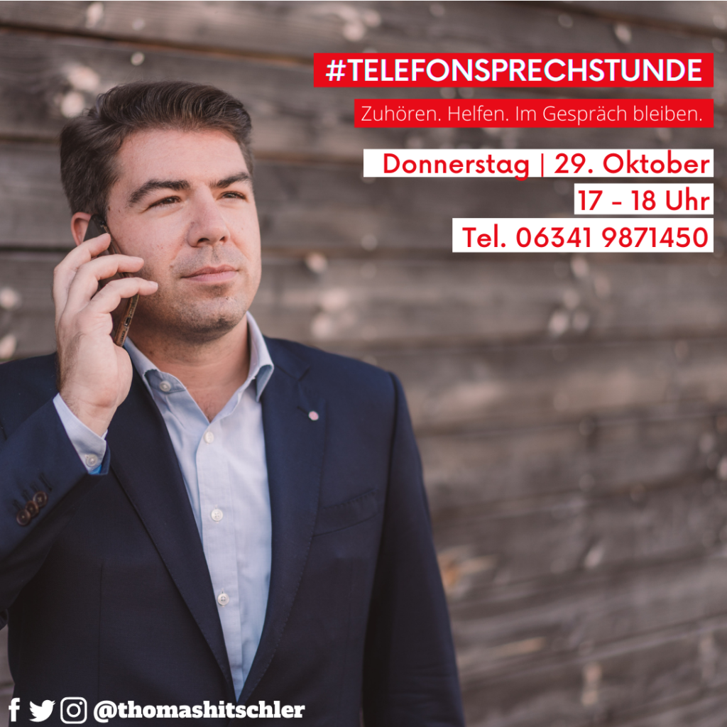 Thomas Hitschler mit Smartphone am Ohr zur Bewerbung der Bürgersprechstunde